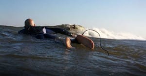 Hyperflex Team Riders Dean Randazzo and Zach Greaser testing the new AMP Series line during Hurricane Danielle in New Jersey.  Dean is paddling out while watching Zach on a wave.